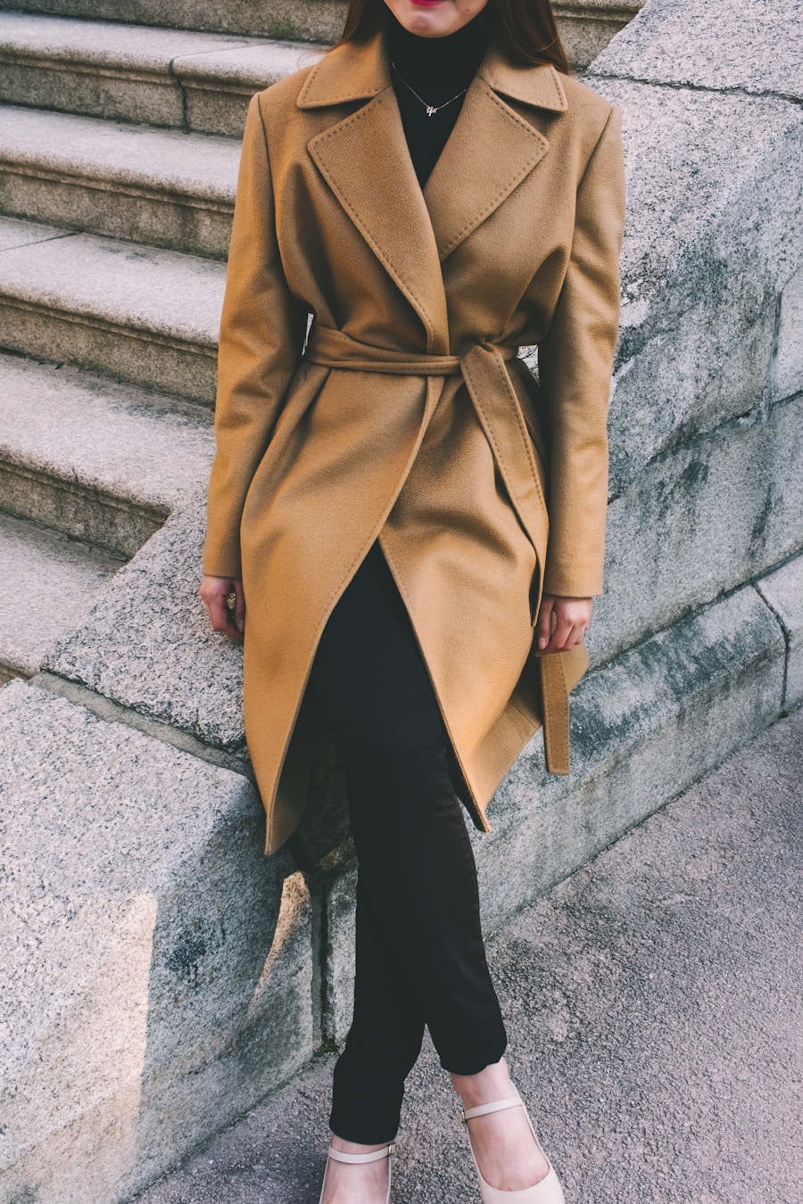 The Aspen Cashmere Wrap Coat — deep charcoal cashmere, belted wrap silhouette